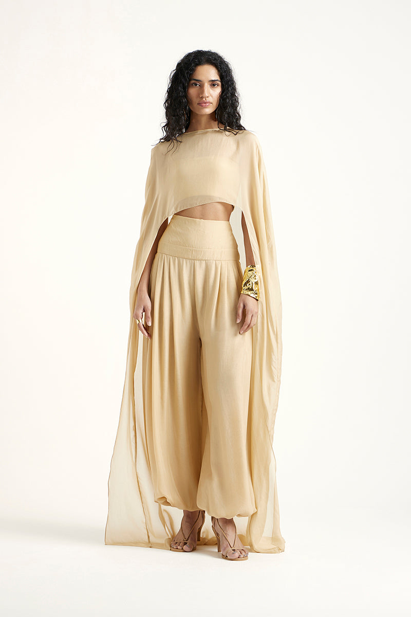 Deme By Gabriella Robin co-ord set in gold, featuring stylish matching top and pants with a chic, modern design.