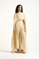 Deme By Gabriella Robin co-ord set in gold, featuring a stylish matching top and pants ensemble for a chic look.