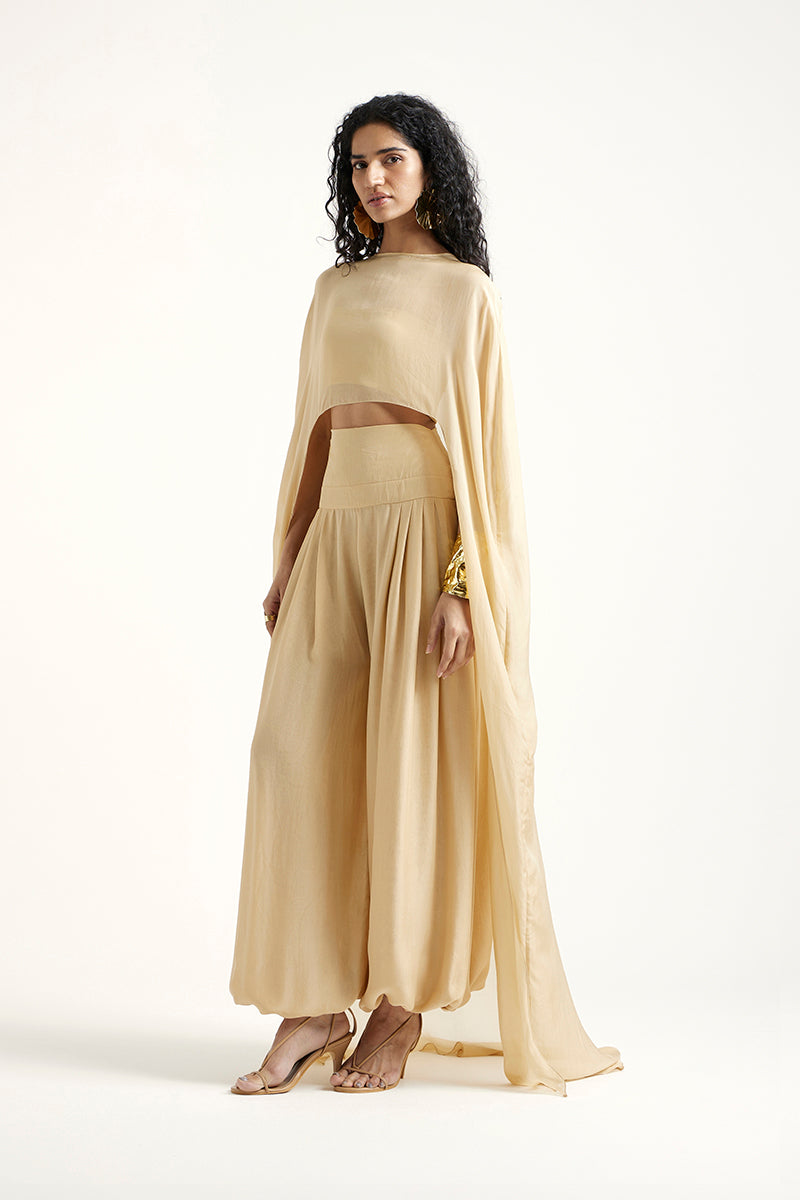 Deme By Gabriella Robin gold co-ord set featuring a matching top and pants, stylish and coordinated fashion ensemble.
