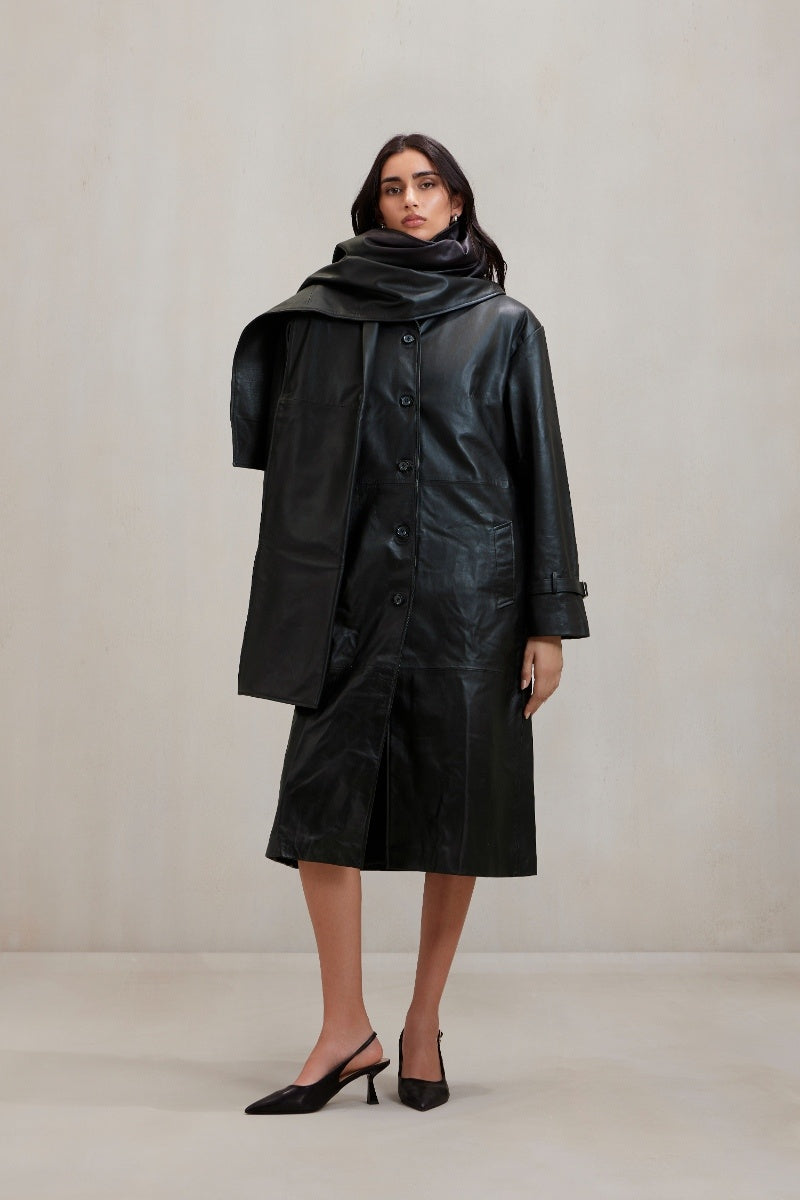 Deme By Gabriella black Cooper coat jacket with a tailored fit, featuring a classic collar and button closure.