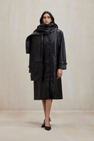Black Cooper coat jacket by Deme By Gabriella, stylish outerwear with a tailored fit and modern design.