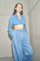URA Denise Stone Washed Jacket displayed hanging, showcasing its casual fit, stone wash finish, and classic jacket style.