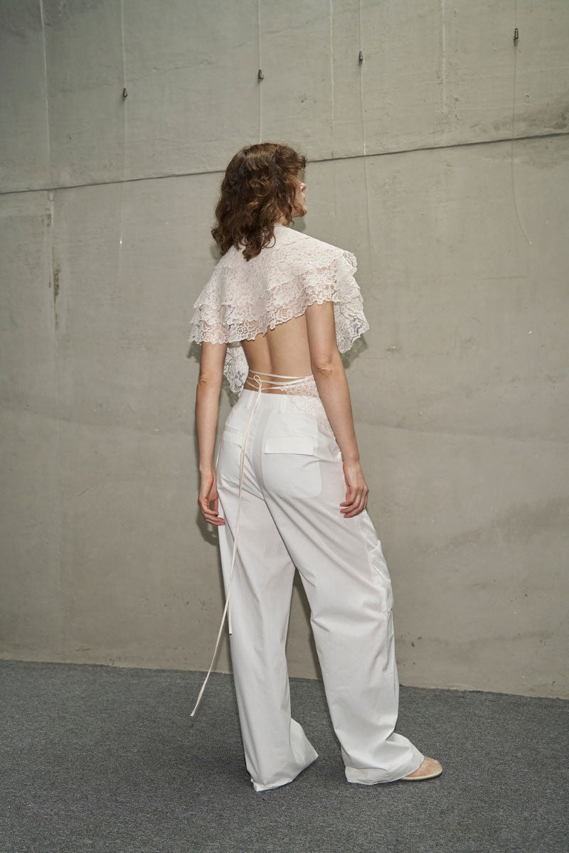 URAI SISILIA TOP in soft fabric, featuring a stylish neckline and relaxed fit, perfect for casual or semi-formal wear.