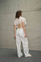 URAI SISILIA tops in a stylish design, showcasing the fabric and fit of this fashionable women's top.