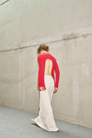 URa Morgan knitwear top in soft fabric, featuring a stylish design with a round neckline and long sleeves.