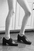 Black DROP DERBY ballerina toe heels by Je La Connais with stylish toe detail and sleek design, perfect for elegant footwear.