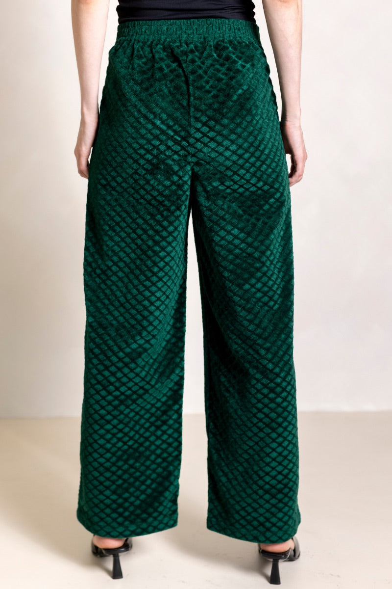 Raishma Alister green loungewear trouser with relaxed fit and elastic waistband, shown in a full-length view.