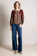 Raishma Harlow Top, stylish women's top with intricate detailing and a flattering fit, displayed on a neutral background.