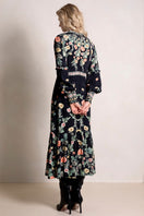 Raishma Maison Dress, a stylish maxi dress with elegant fabric and flowing design, showcased in a full-length image.