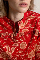 Red Raishma Esme shirt with long sleeves and a classic collar, displayed on a white background.