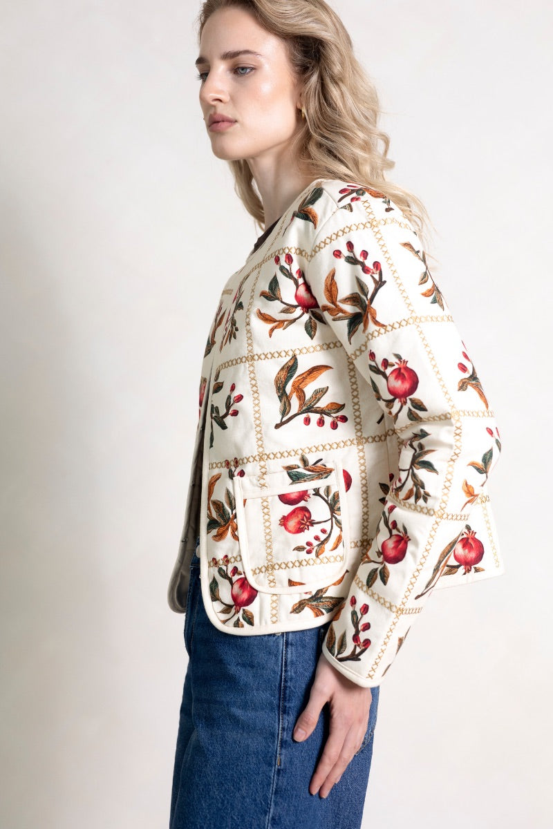 Raishma Demi Jacket, stylish women's jacket with tailored fit and modern design, shown in a fashionable outdoor setting.