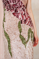 Raishma Natalia pink gown featuring elegant fabric, flowing design, and intricate details, perfect for formal occasions.