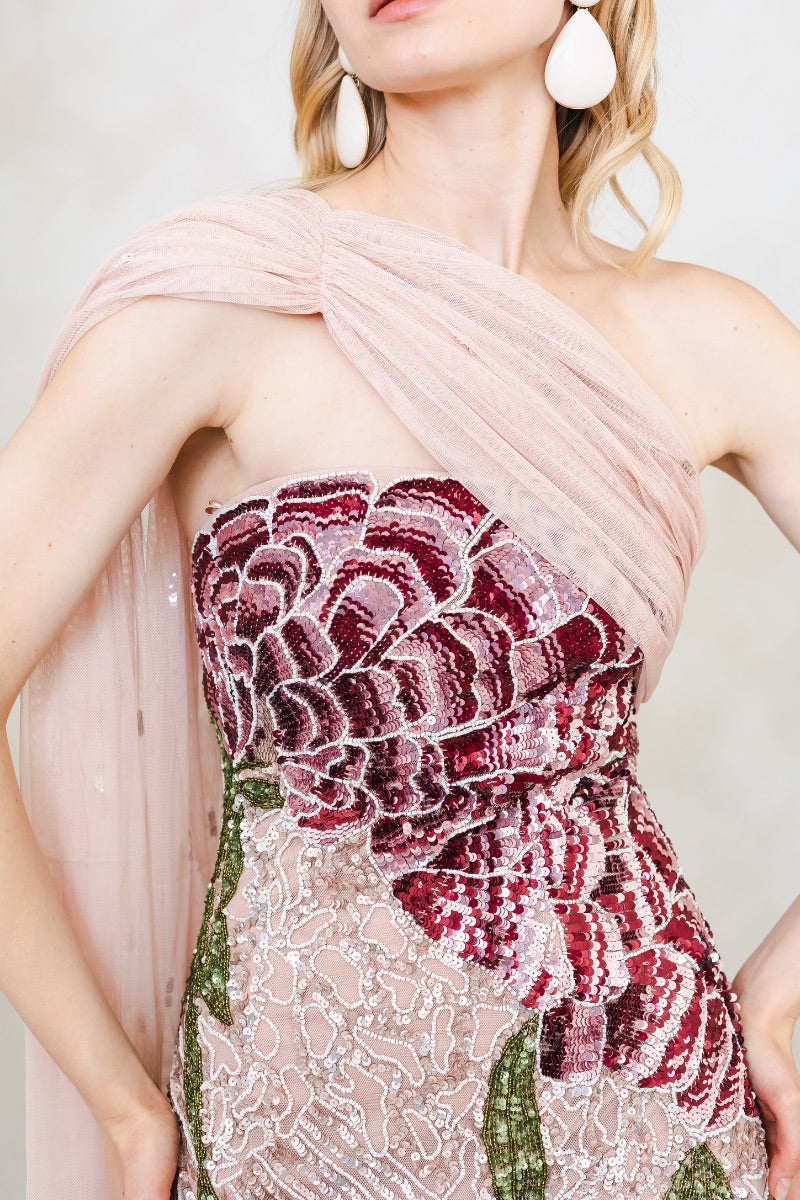 Pink Natalia gown by Raishma, elegant evening dress featuring flowing fabric and intricate detailing, displayed on a mannequin.