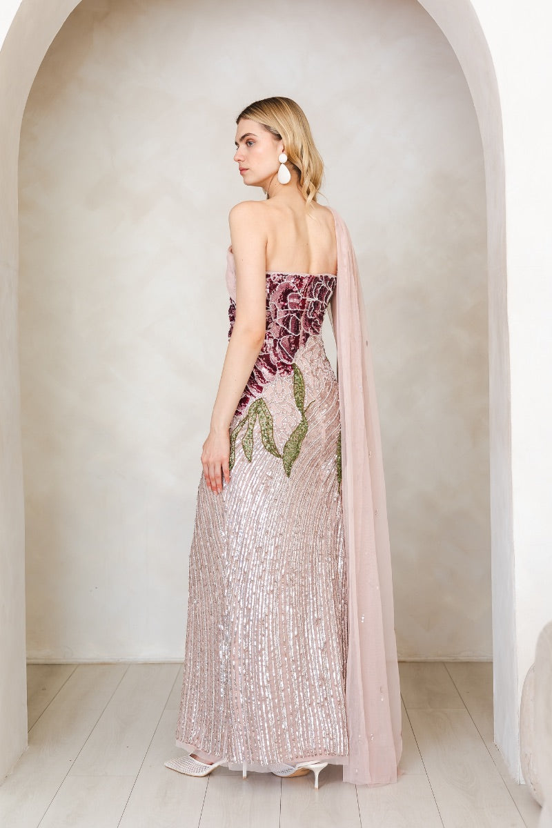 Raishma Natalia pink gown showcasing elegant fabric and flowing silhouette, perfect for formal occasions.