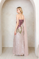 Raishma Natalia pink gown showcasing elegant fabric and flowing silhouette, perfect for formal occasions.