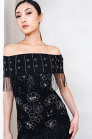 Raishma Felicity gown featuring elegant fabric and intricate design, perfect for formal occasions.