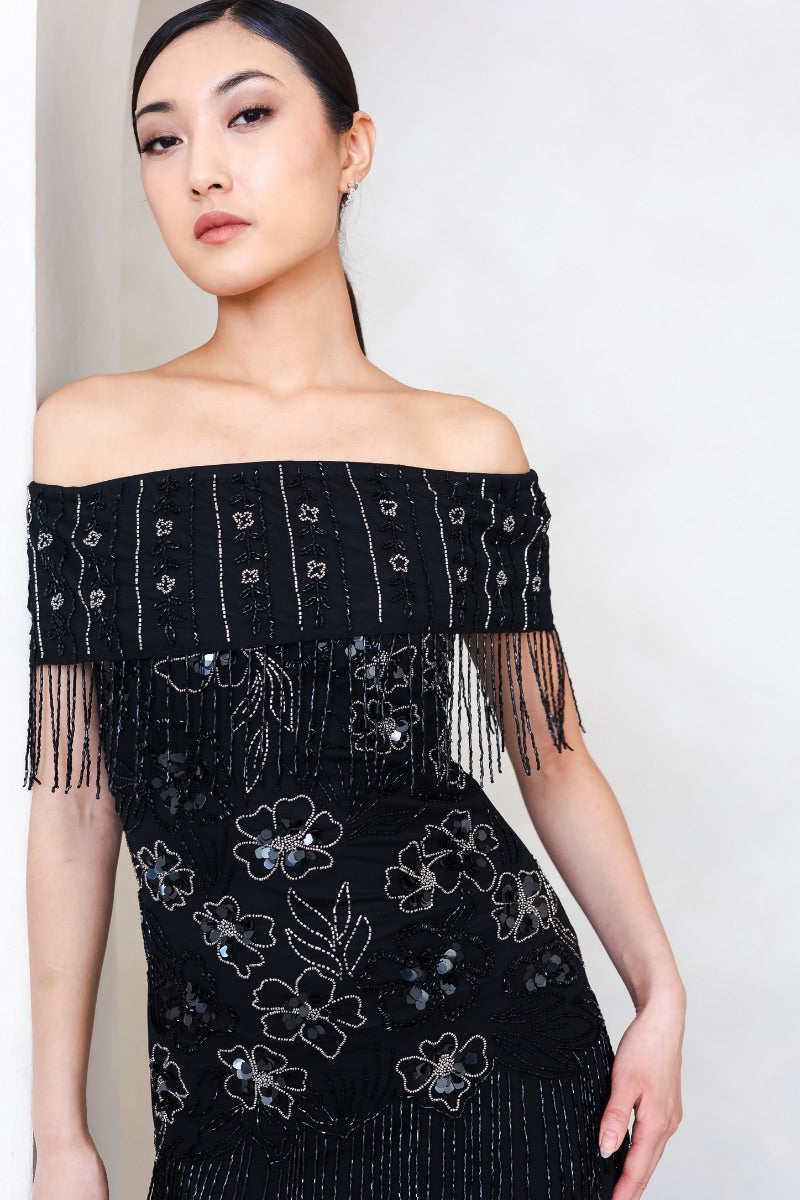 Raishma Felicity gown featuring elegant fabric and intricate design, perfect for formal occasions.