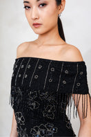 Elegant Raishma Felicity Gown with flowing fabric and intricate details, perfect for formal occasions or evening wear.
