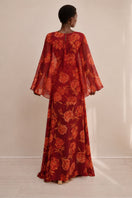 Red Raishma Karina maxi dress with flowing fabric and elegant design, perfect for formal occasions.