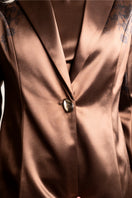 Raishma Jemma Chocolate Jacket, stylish women's top with a tailored fit and chocolate brown fabric, shown on a hanger.