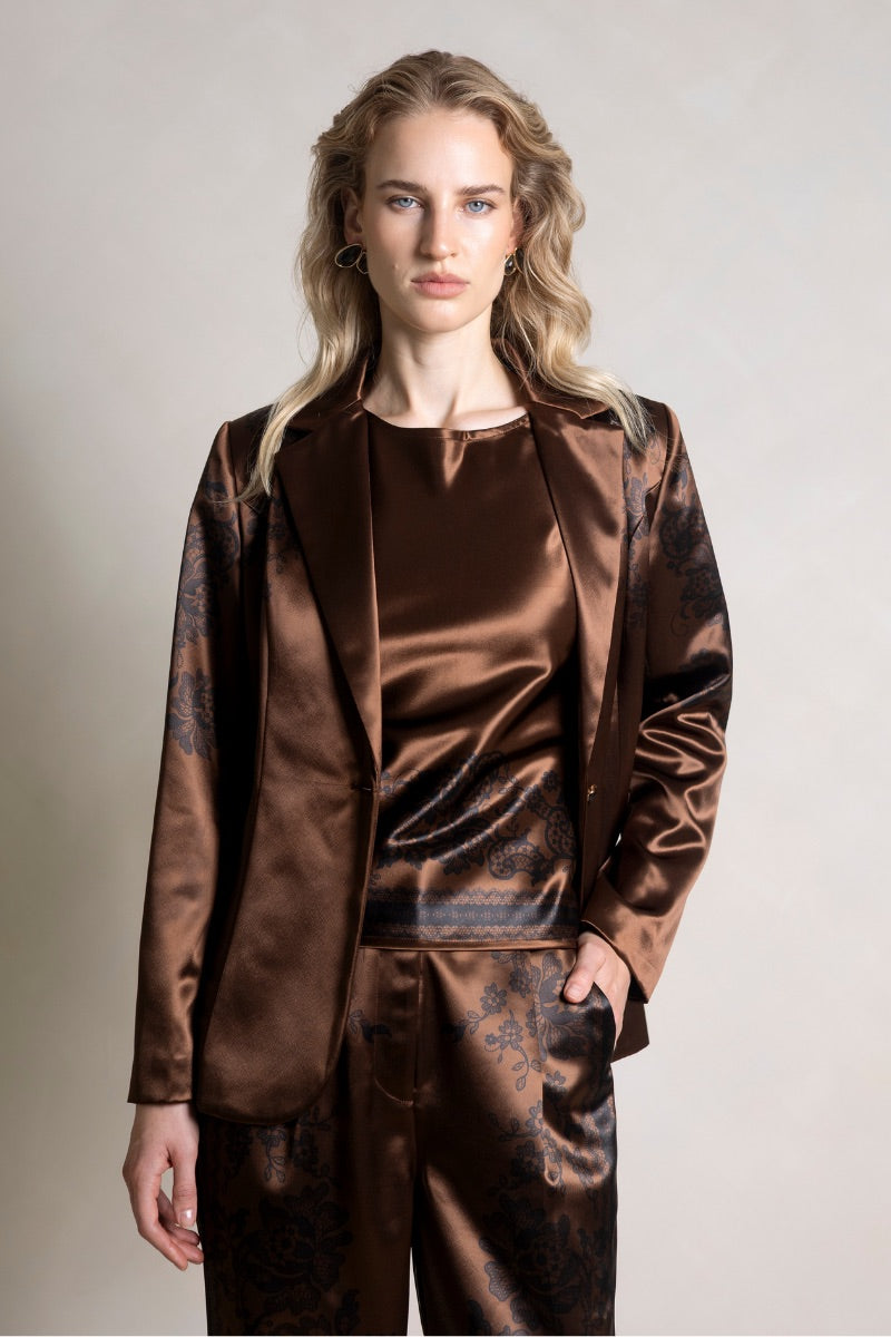 Raishma Jemma Chocolate Jacket, stylish women's top with a fitted design and chocolate brown color, displayed on a hanger.