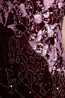 Elegant Natalia Plum gown by Raishma featuring flowing fabric and intricate detailing, perfect for formal occasions.