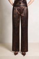 Raishma Jemma chocolate trousers, stylish pants with a tailored fit, shown in a front view on a plain background.
