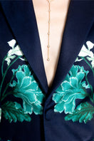 Raishma Jane jacket in blue, stylish women's jacket with a tailored fit, displayed on a hanger against a neutral background.