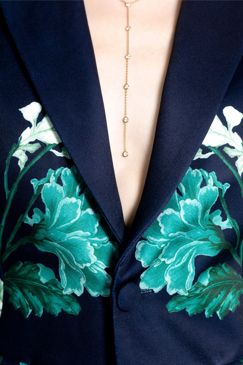 Raishma Jane jacket in blue, stylish women's jacket with a tailored fit, displayed on a hanger against a neutral background.