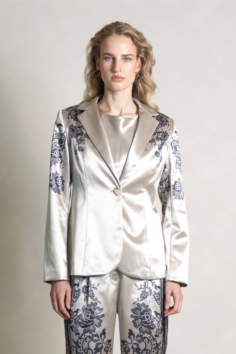 Raishma Jemma Gold Jacket, stylish women's tops with a shimmering gold finish, featuring a fitted design and elegant collar.