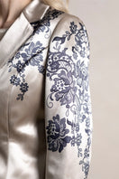 Raishma JEMMA Gold Jacket, stylish tops with metallic gold finish, shown on a hanger against a neutral background.