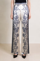 Raishma Jemma Gold Trousers, stylish pants with a metallic gold finish, shown on a plain background.