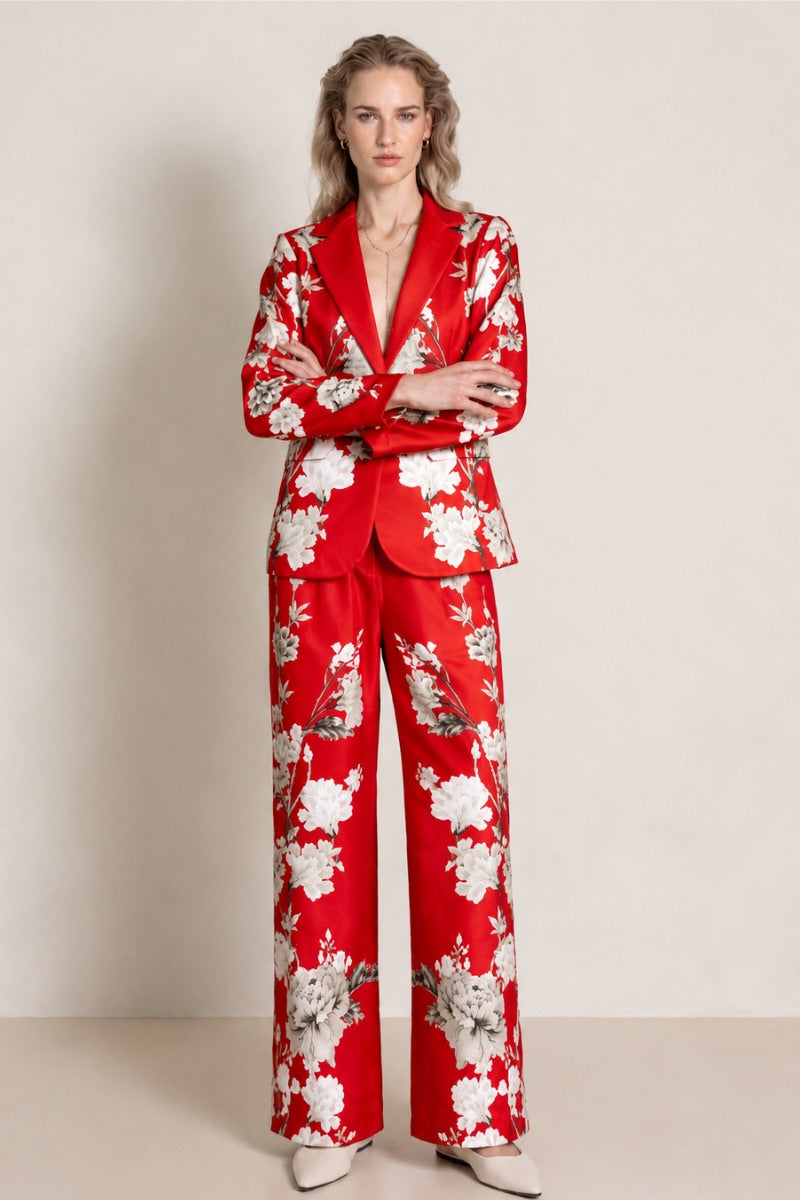 Raishma Zena Trousers, stylish pants in a relaxed fit with a high waist, shown in a neutral fabric with minimal detailing.