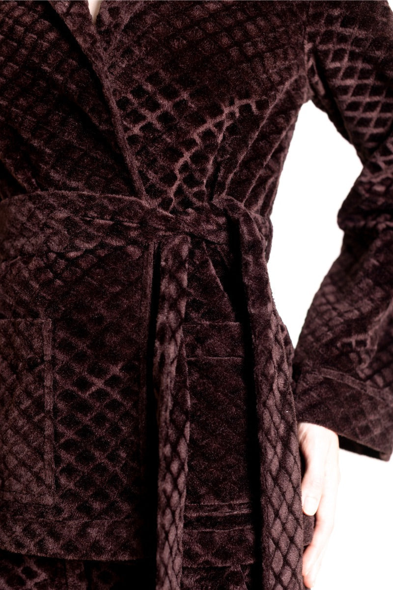 Raishma Viana gold loungewear jacket with a relaxed fit and soft fabric, displayed on a neutral background.