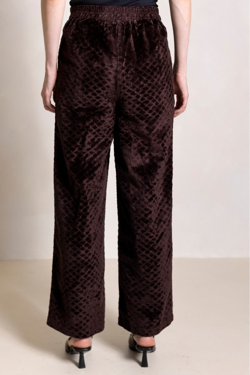 Raishma Alister Gold Loungewear Trousers with a relaxed fit and stylish design, shown in a full-length view.