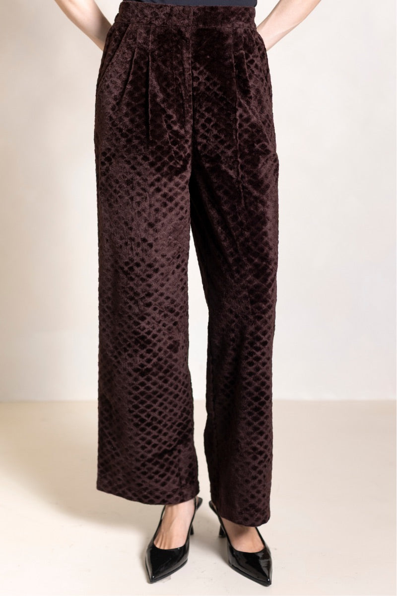 Raishma Alister Gold Loungewear trouser with a relaxed fit and soft fabric, shown in a stylish gold color.