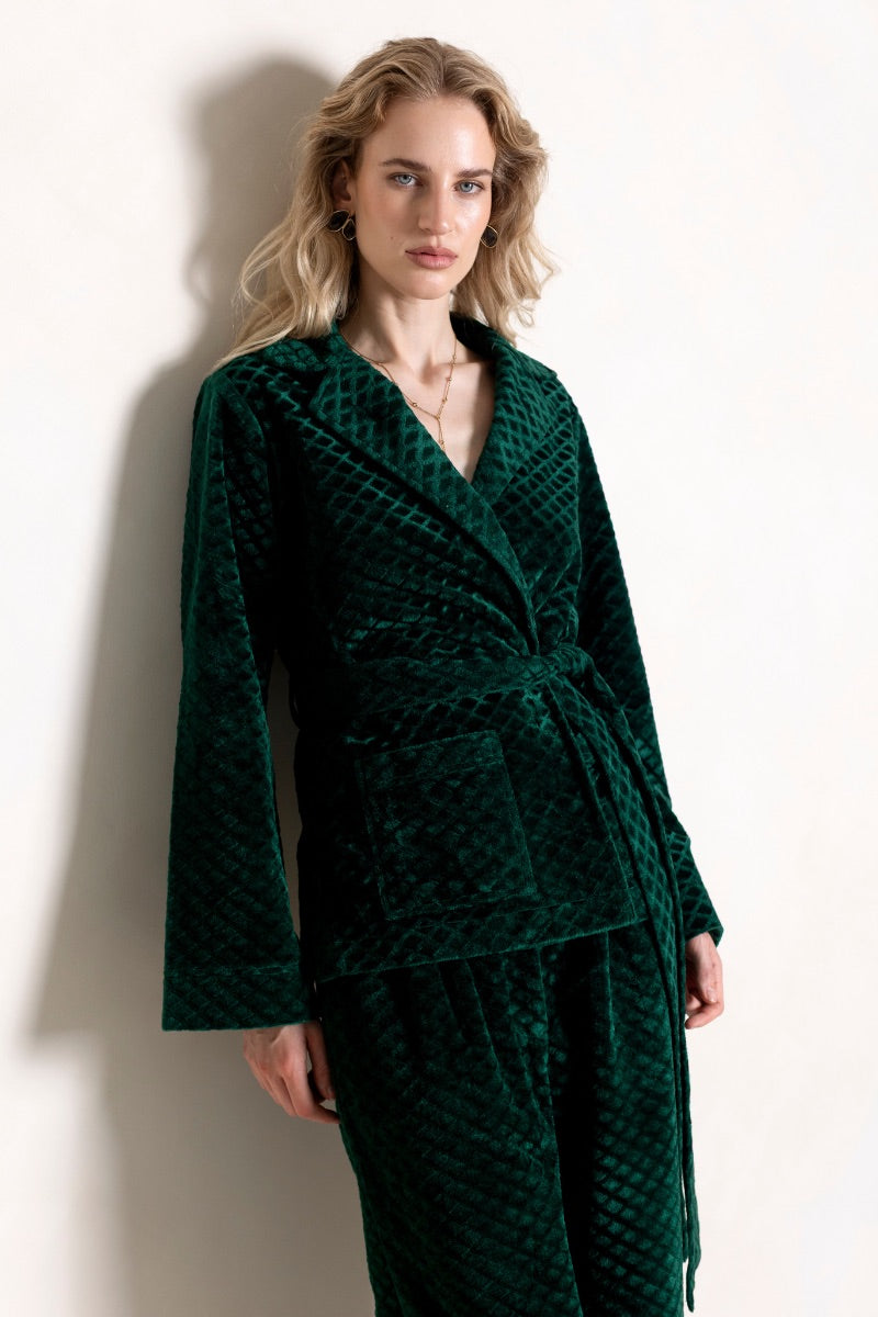 Raishma Viana green loungewear jacket shown in the image, with a relaxed fit and soft fabric for comfortable casual wear.