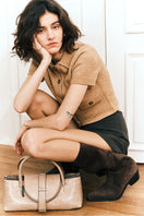 Je La Connais Brunny suede boots in chocolate color, featuring a stylish ankle design and textured suede material.