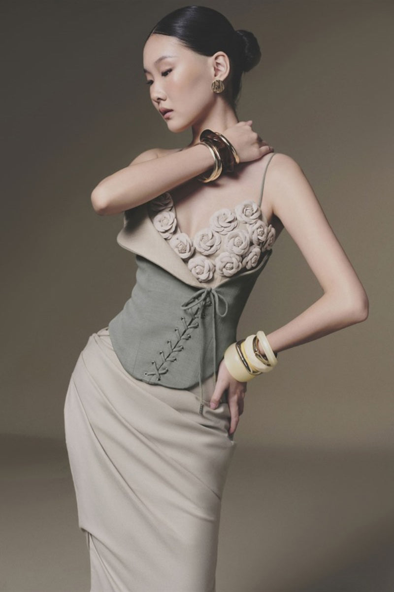 Blue mint Camellia corset top by Keira Tong featuring structured design and supportive fit, displayed on a mannequin.