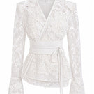 Keira Tong lace wrap top featuring delicate lace fabric and stylish design, perfect for casual or semi-formal wear.