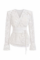 Keira Tong lace wrap top featuring delicate lace fabric and stylish design, perfect for casual or semi-formal wear.
