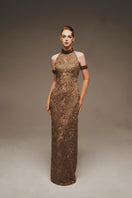 Elegant Seraphina lace halter gown by Margée Atelier featuring intricate lace details and a flowing silhouette.