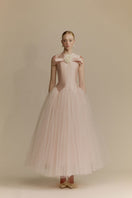 White Plan Magnolia dress gown with floral design and elegant fabric, perfect for formal occasions.