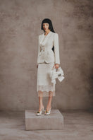 White Plan ivory lace co-ord set featuring a tailored blazer and matching pants, styled with elegant lace details.