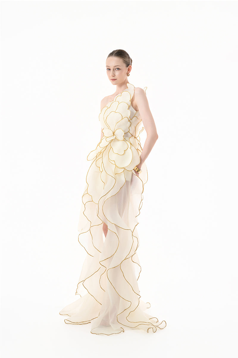Ivory sculpted petal gown by HAPPY CLOTHING, stylish CULT MIA X design, featuring elegant draped fabric and intricate detailing.