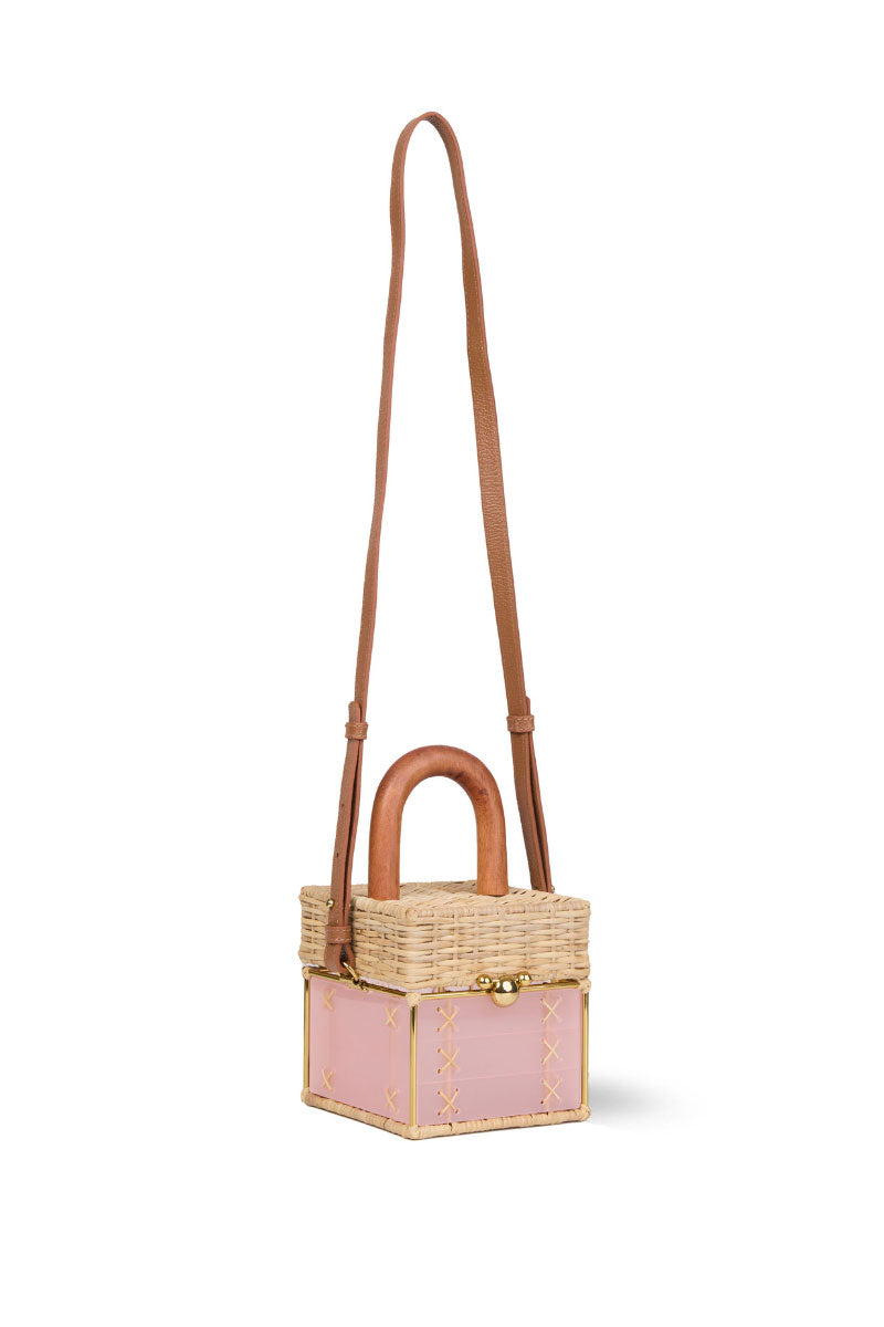 Pink Waiwai Rio Cacau Bag in top handle style with sleek design and rounded shape, perfect for stylish everyday use.