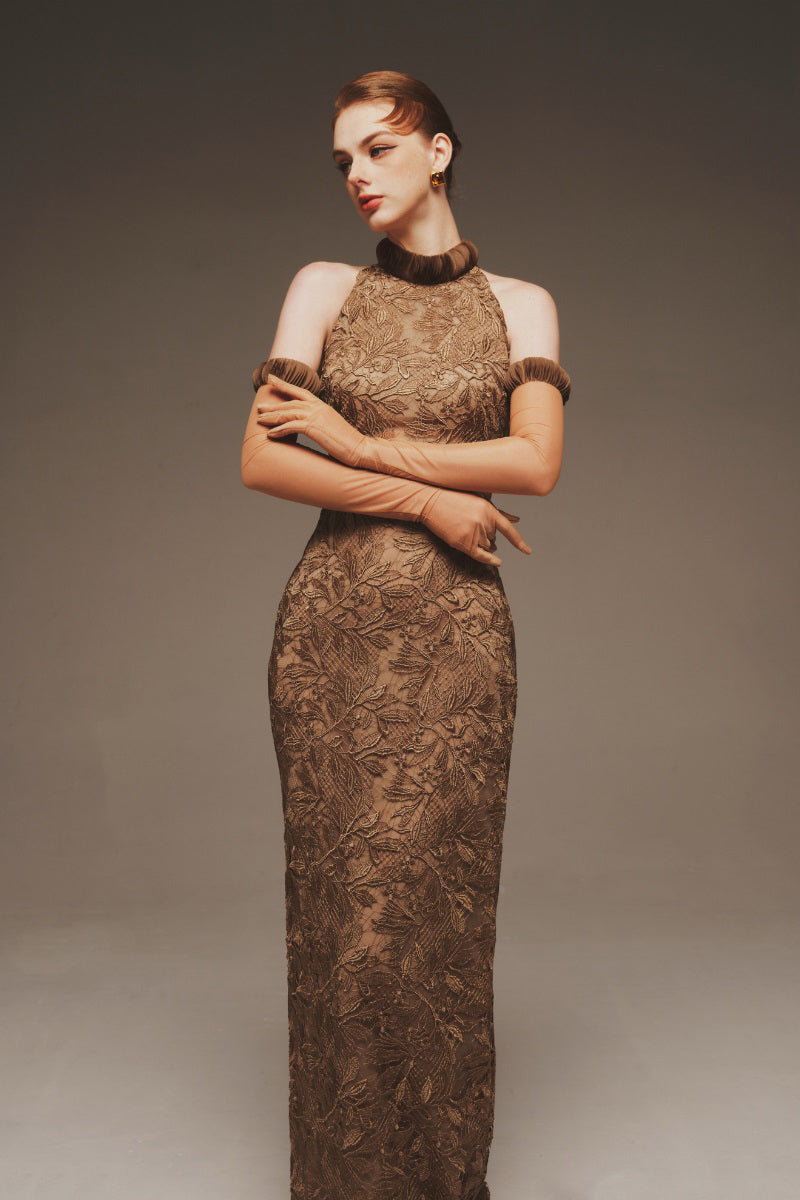 Elegant black Seraphina Lace Halter Maxi Dress by Margée Atelier featuring intricate lace details and a flowing silhouette.