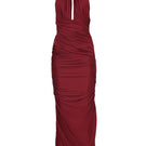 Aquarel Studio burgundy Stella maxi dress displayed on a hanger, showcasing its flowing fabric and elegant design.