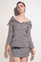 Valenciani multicolor tweed mini skirt with a fitted waist and stylish pattern, perfect for trendy casual or dressy outfits.