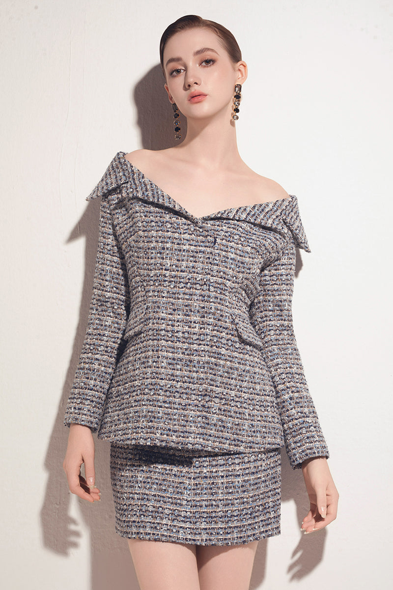 Valenciani multicolor off-shoulder jacket with long sleeves and relaxed fit, featuring vibrant, bold patterns.